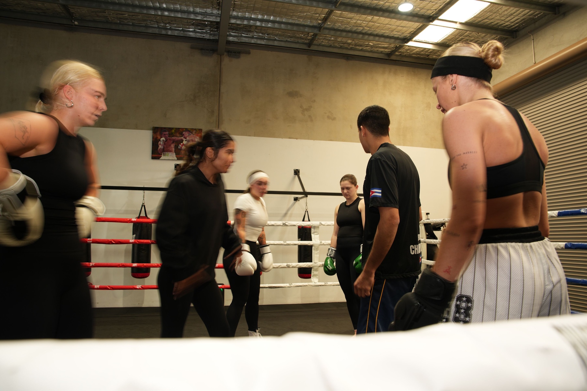 Female boxing class warming up