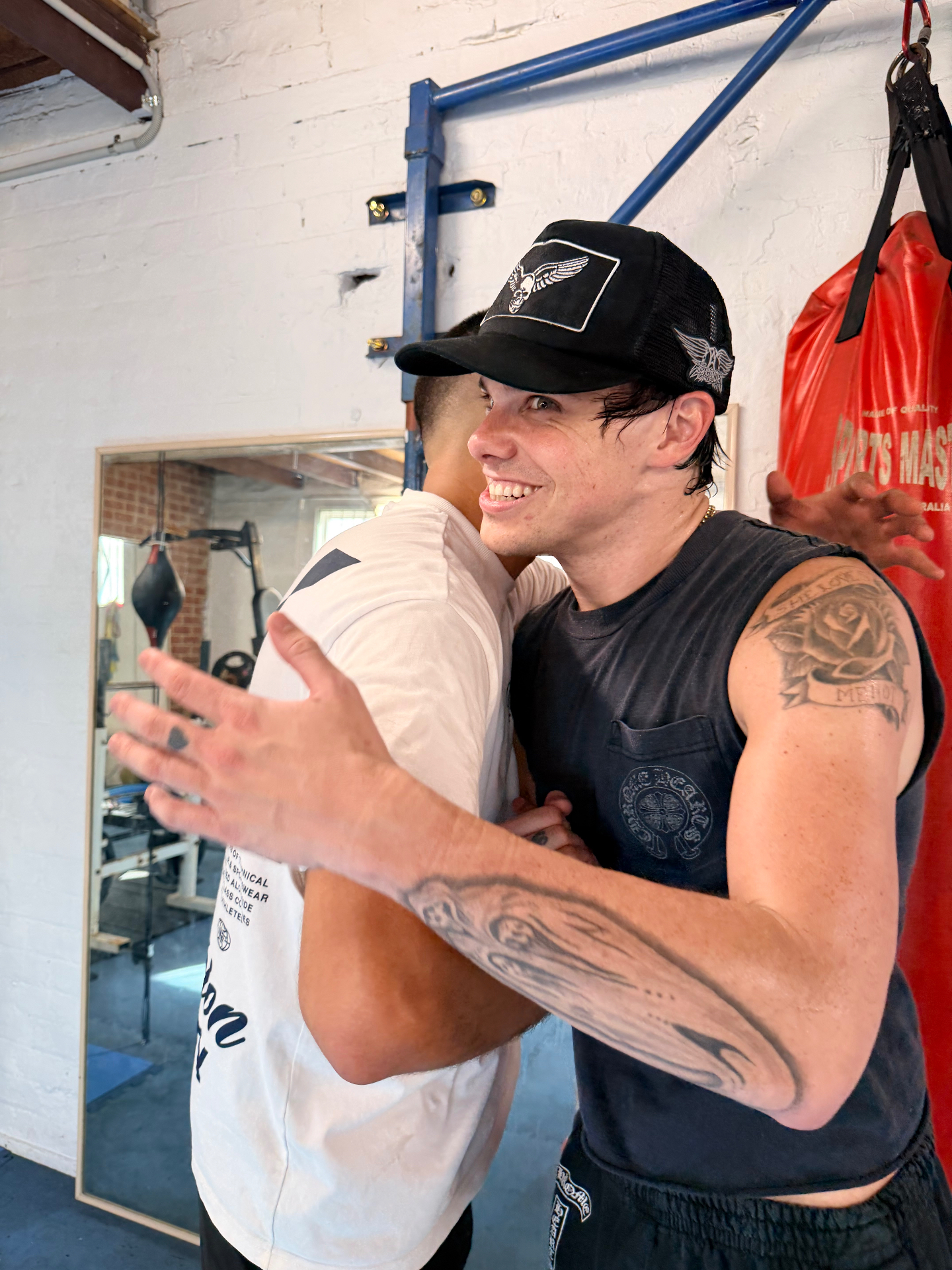 Ruben sharing a hug with YUNGBLUD after training