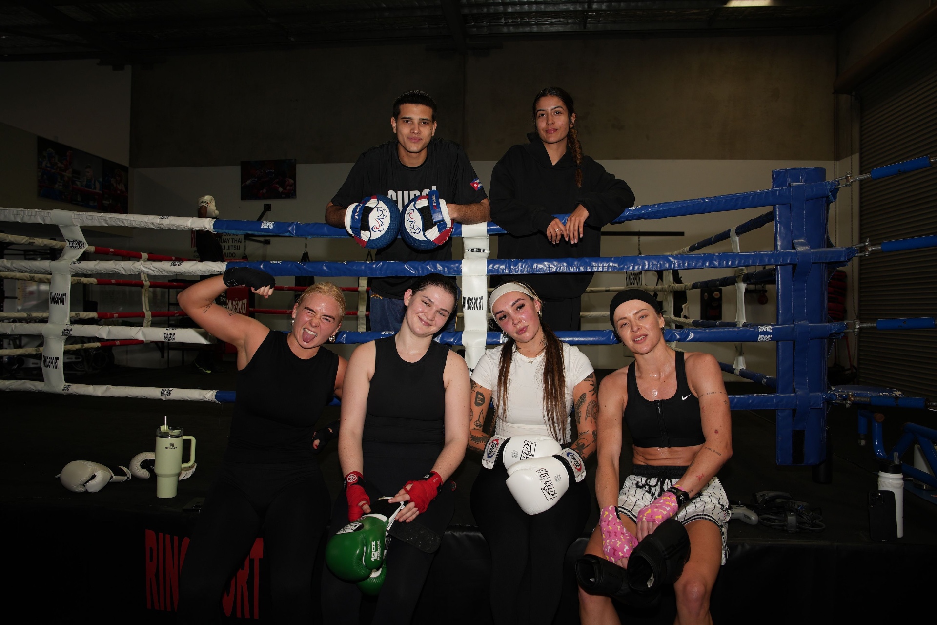 Cubox crew posing at ringside after training