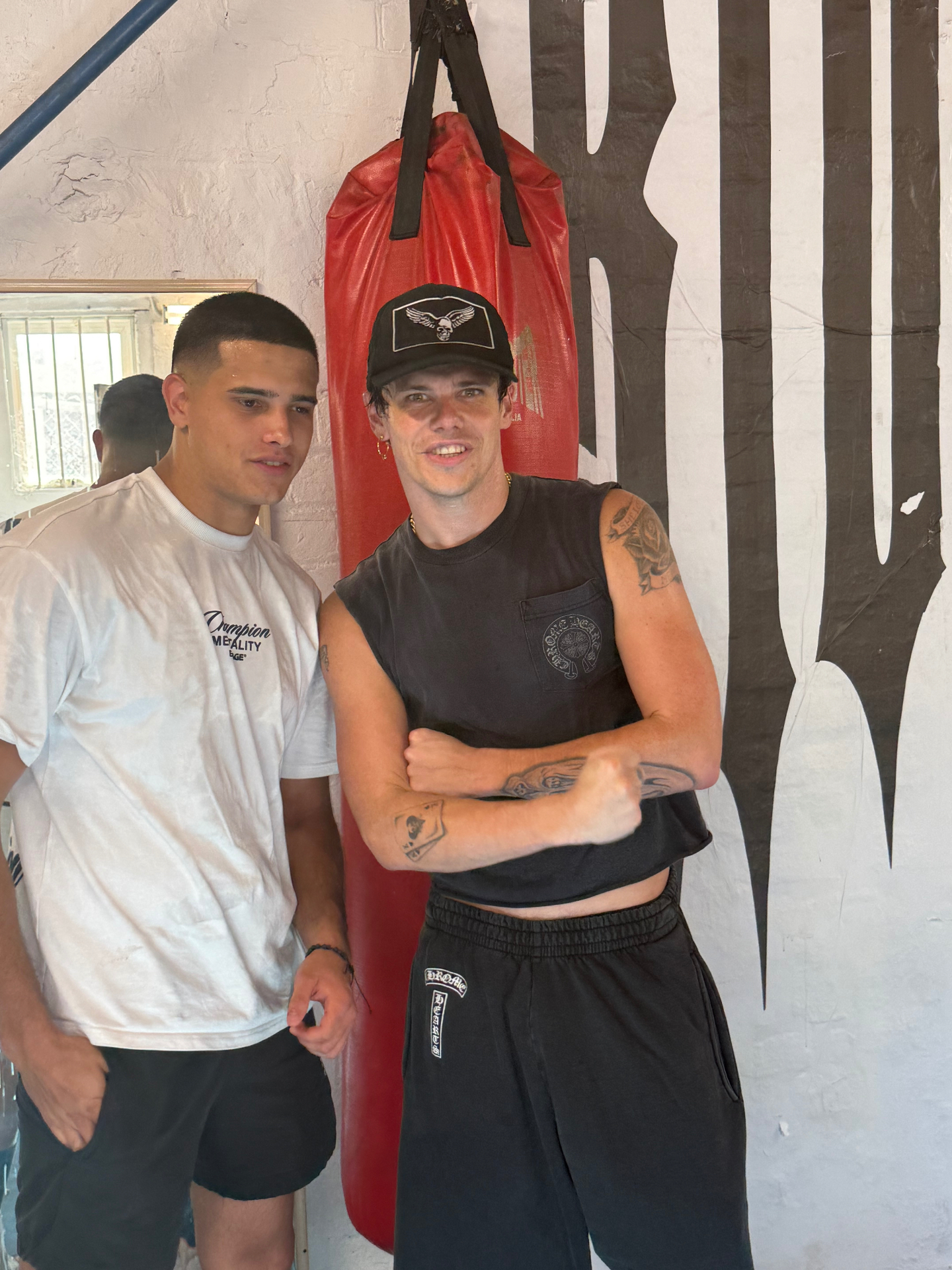 Ruben and YUNGBLUD posing with raised fists